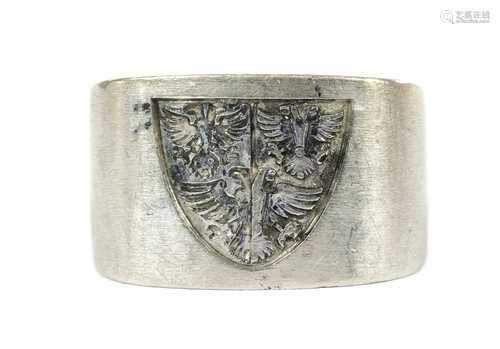 A white gold signet ring,