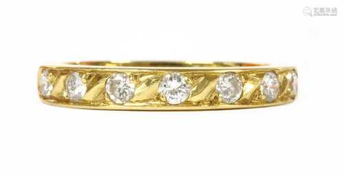 An 18ct gold diamond half eternity ring,