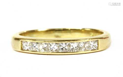 An 18ct gold diamond half eternity ring,