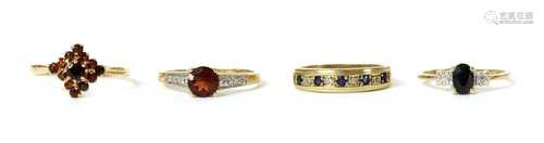 Four 9ct gold rings,