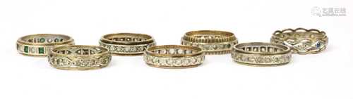 Seven paste or synthetic spinel full eternity rings,