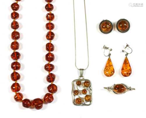 A collection of clarified amber jewellery,