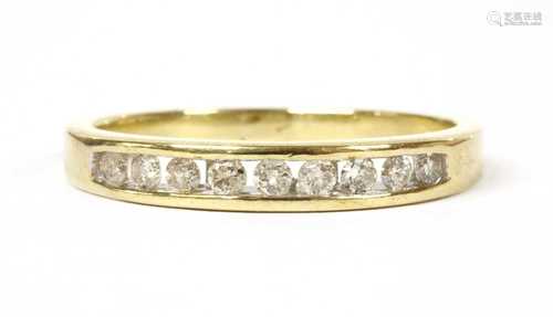 A gold diamond half eternity ring,