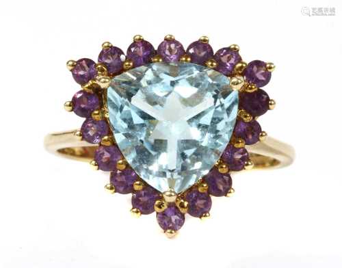 A 9ct gold blue topaz and amethyst halo cluster ring,