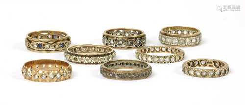 Eight paste or synthetic spinel full eternity rings,