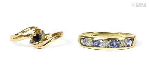 A gold sapphire and diamond three stone ring,