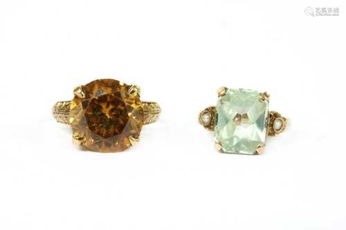 An American gold single stone orange zircon ring,