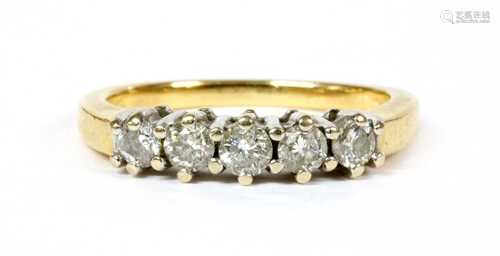 An 18ct gold five stone diamond ring,