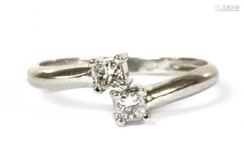 A platinum two stone diamond ring,