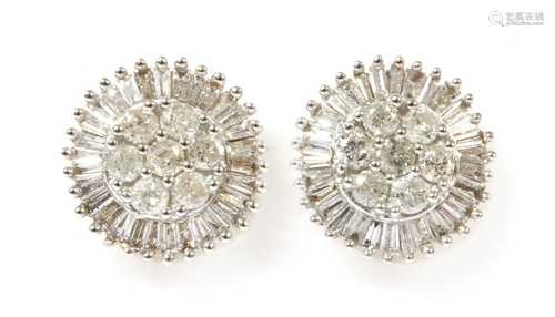 A pair of gold diamond cluster earrings,