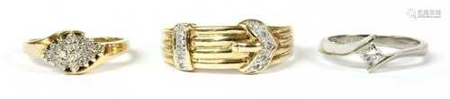 A 9ct gold diamond set buckle ring,