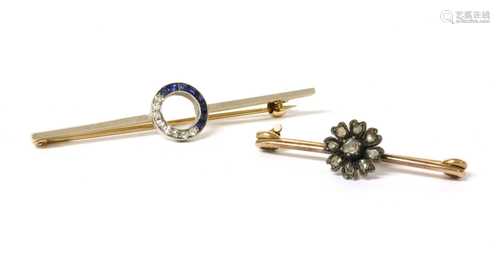 A diamond and sapphire bar brooch,