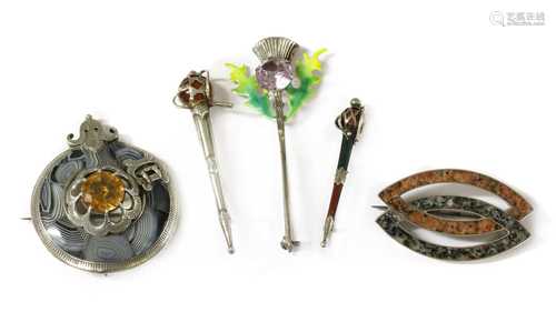 A quantity of Scottish silver brooches,