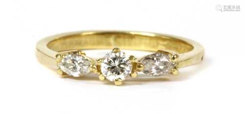 An 18ct gold three stone diamond ring,