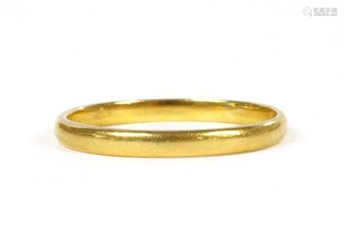 A 22ct gold light court section wedding ring,