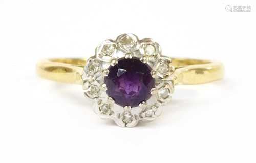 An 18ct gold amethyst and diamond cluster ring,