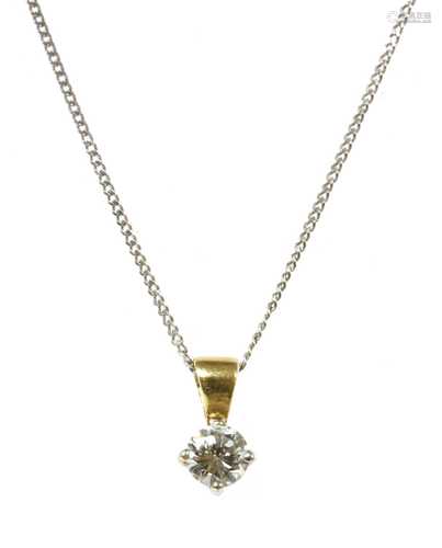 A gold single stone diamond pendant,