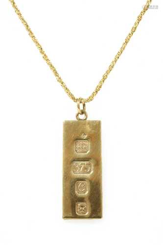 A 9ct gold ingot pendant,