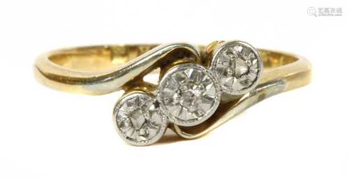 A gold three stone diamond ring, c.1925,