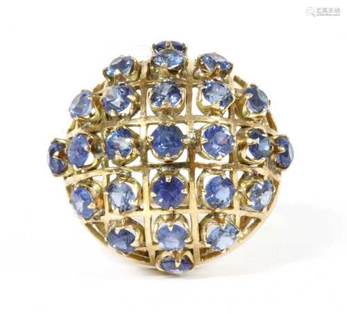 A gold sapphire bombé ring,