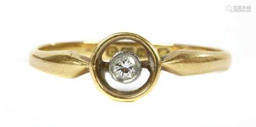 An 18ct gold single stone diamond ring, c.1920,