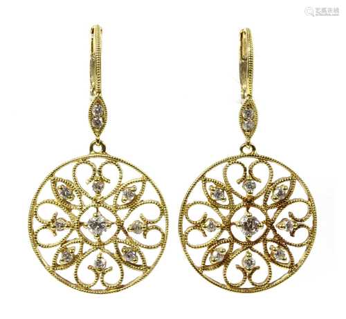 A pair of gold diamond drop earrings,