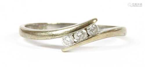 A 9ct white gold three stone diamond ring,