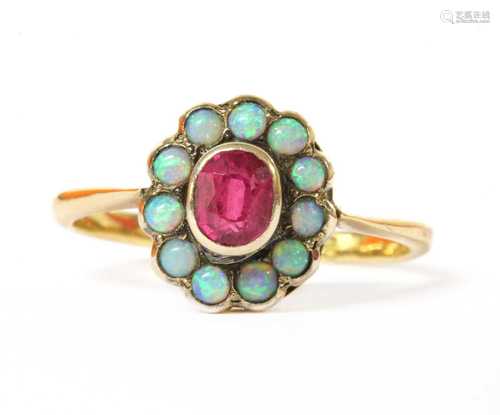 A gold ruby and opal cluster ring,