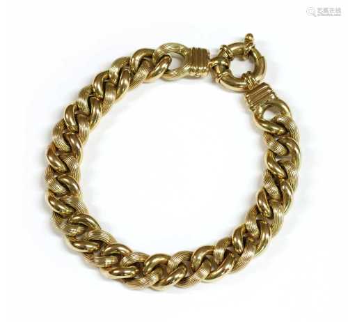 A gold hollow curb bracelet,