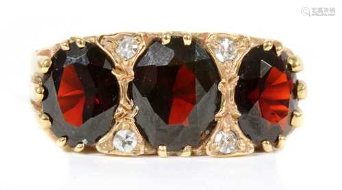 A 9ct gold garnet and diamond ring,