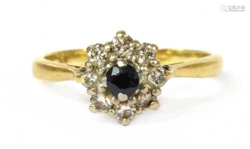 A gold sapphire and diamond cluster ring,