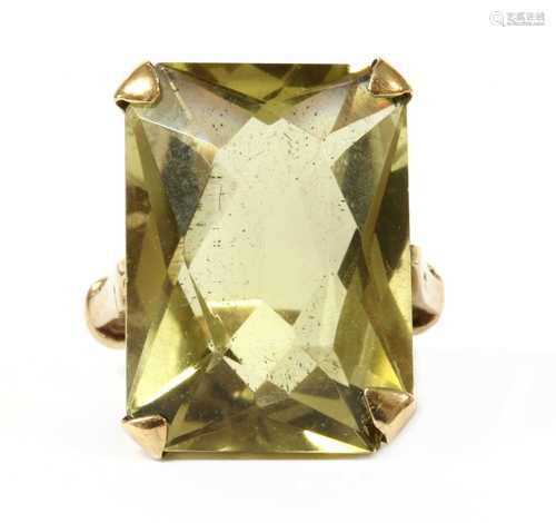 A gold single stone citrine ring,