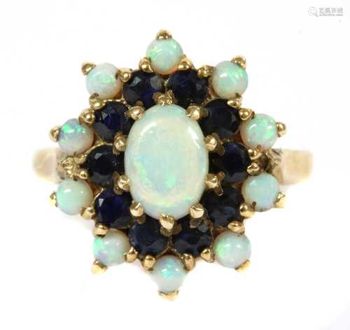 A 9ct gold opal and sapphire cluster ring,