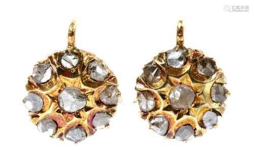 A pair of gold diamond cluster earrings,