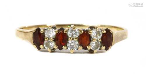 A 9ct gold garnet and cubic zirconia ring,