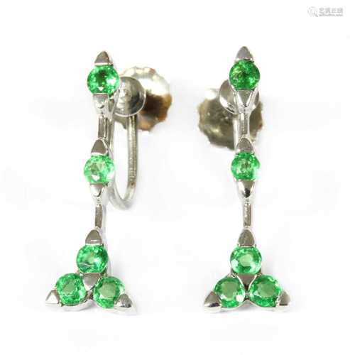 A pair of white gold demantoid garnet earrings,