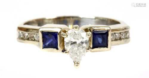 A white gold diamond and sapphire ring,