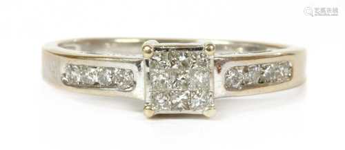 An 18ct white gold diamond cluster ring,