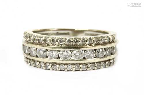 A white gold three row diamond ring,