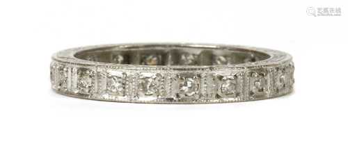 A white gold diamond full eternity ring,