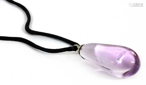 A platinum amethyst and diamond pendant,