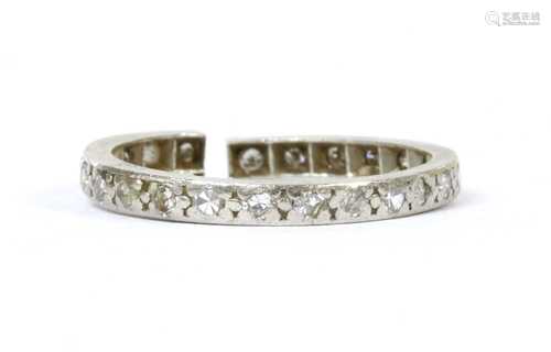 A platinum diamond eternity ring,