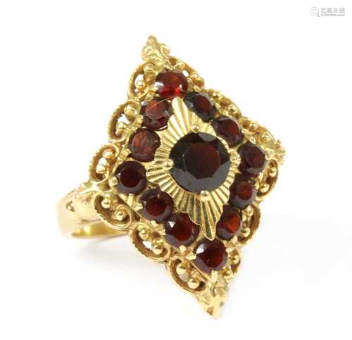 A gold garnet ring,