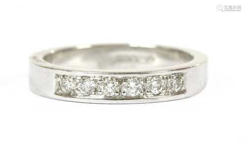 A 9ct white gold diamond half eternity ring,