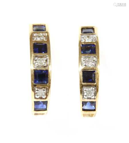 A pair of gold sapphire and diamond 'J' hoop earrings,