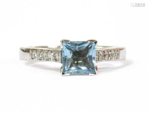 An 18ct white gold aquamarine and diamond ring,