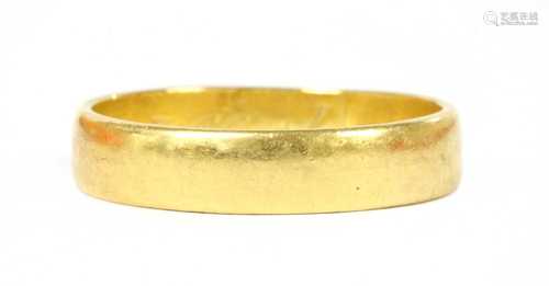 A 22ct gold flat section wedding ring,