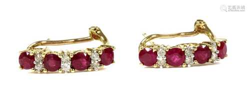 A pair of 9ct gold ruby and diamond half hoop earrings,