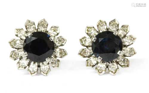 A pair of white gold sapphire and diamond cluster earrings,