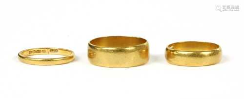 Three 22ct gold wedding rings,